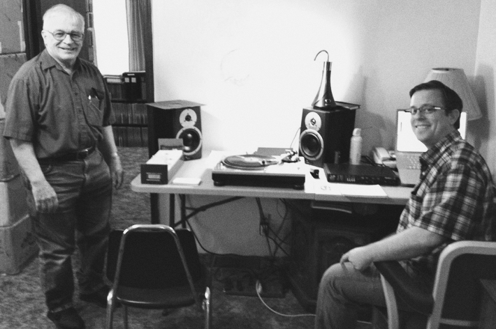 Frank Mare at his turntable with his record collection
