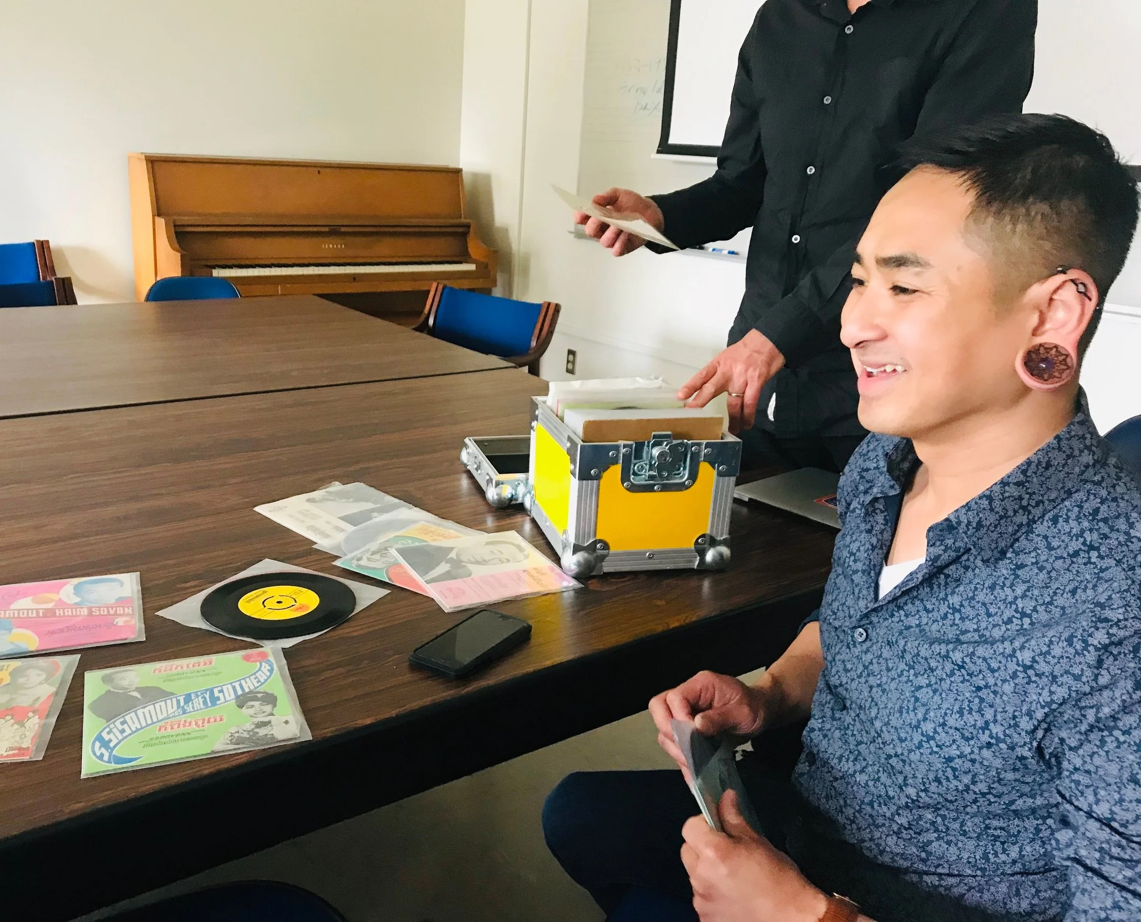Archivist Nate Hun digitizing his Cambodian vinyl collection